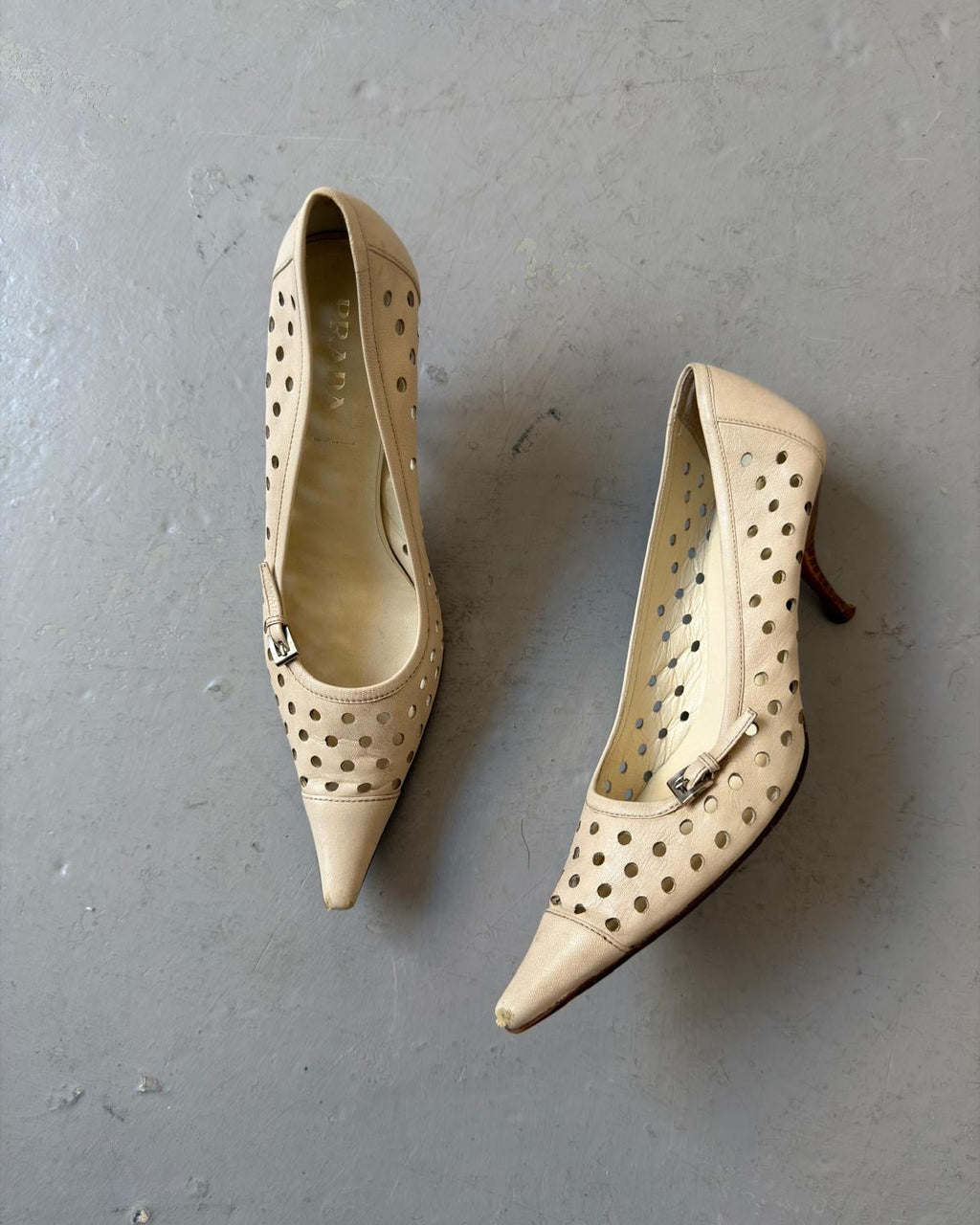 Prada laser hole point heels