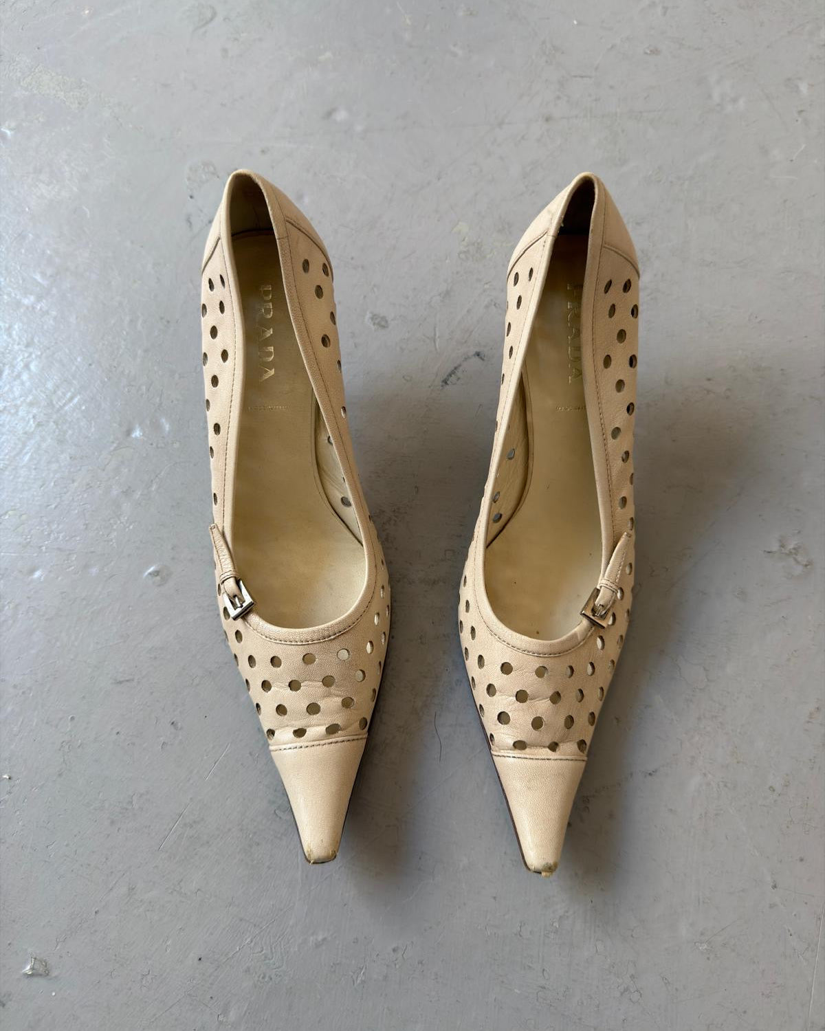 Prada laser hole point heels