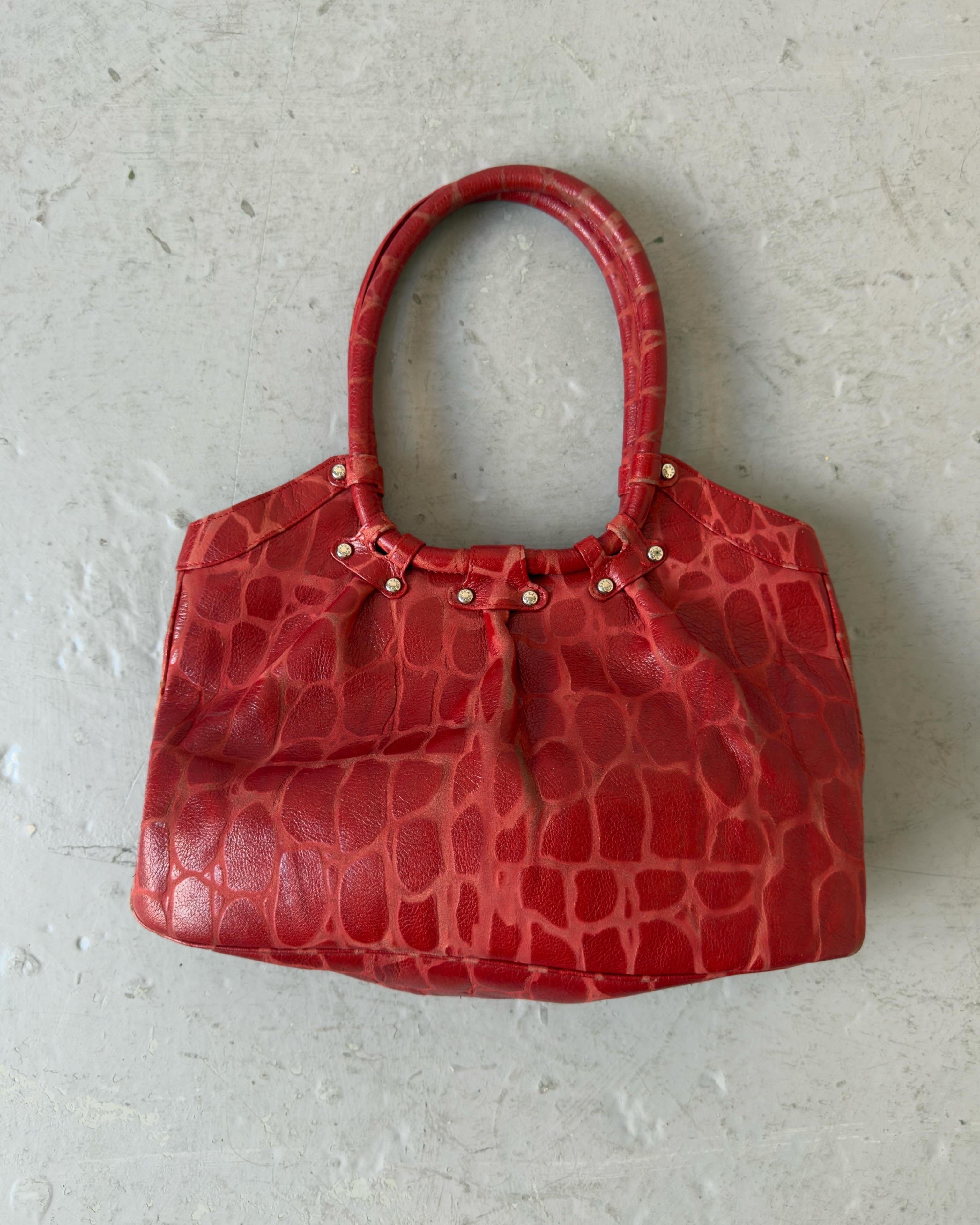 Red crocodile stud bag