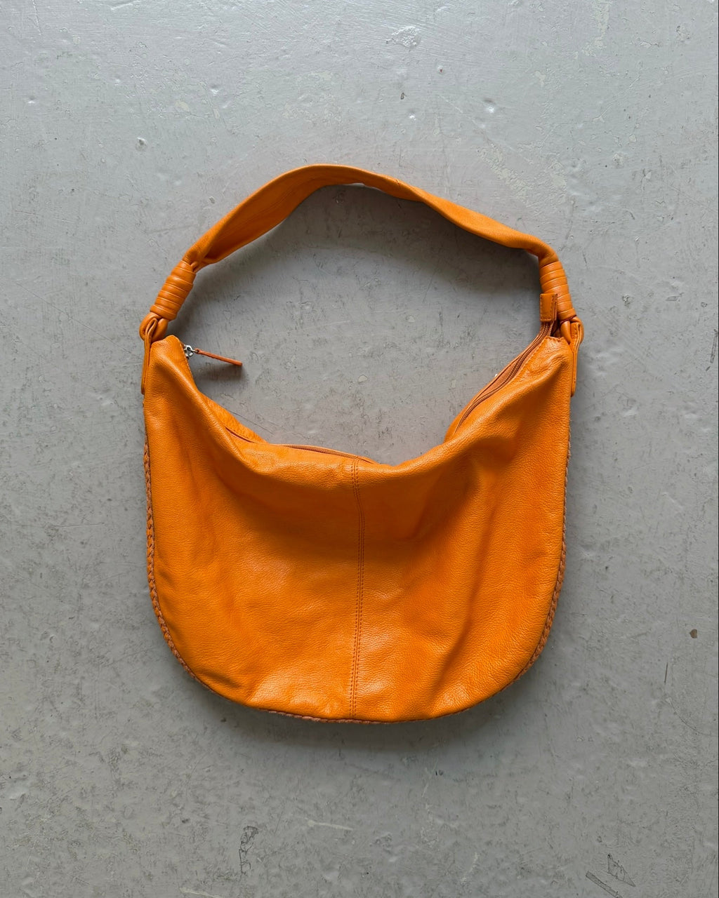 Orange slouchy leather bag
