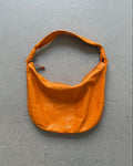 Orange slouchy leather bag