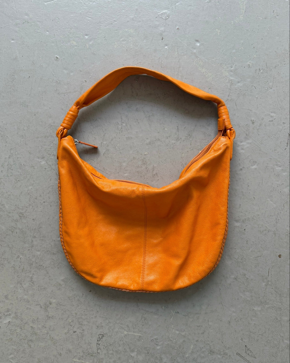Orange slouchy leather bag