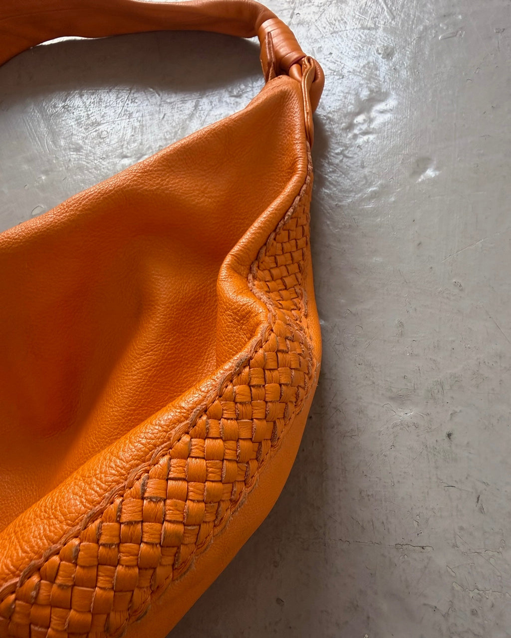 Orange slouchy leather bag