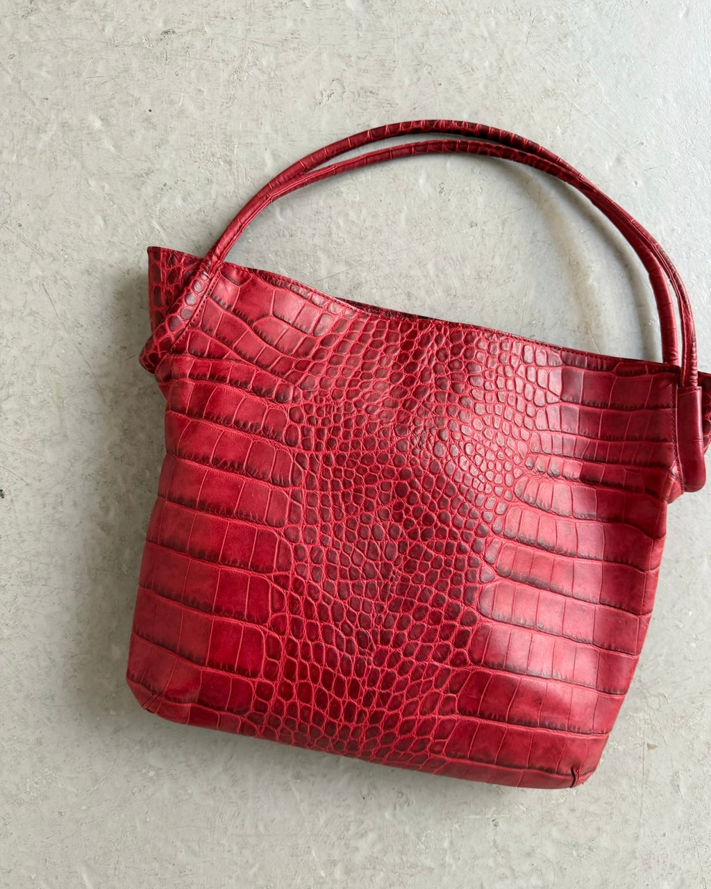 Red croc print bag