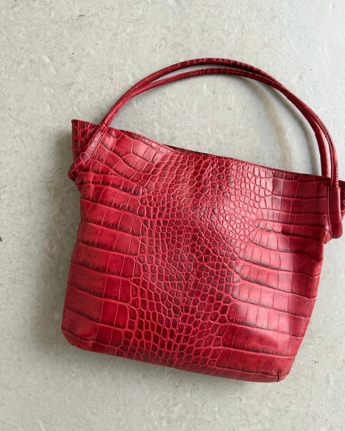 Red croc print bag