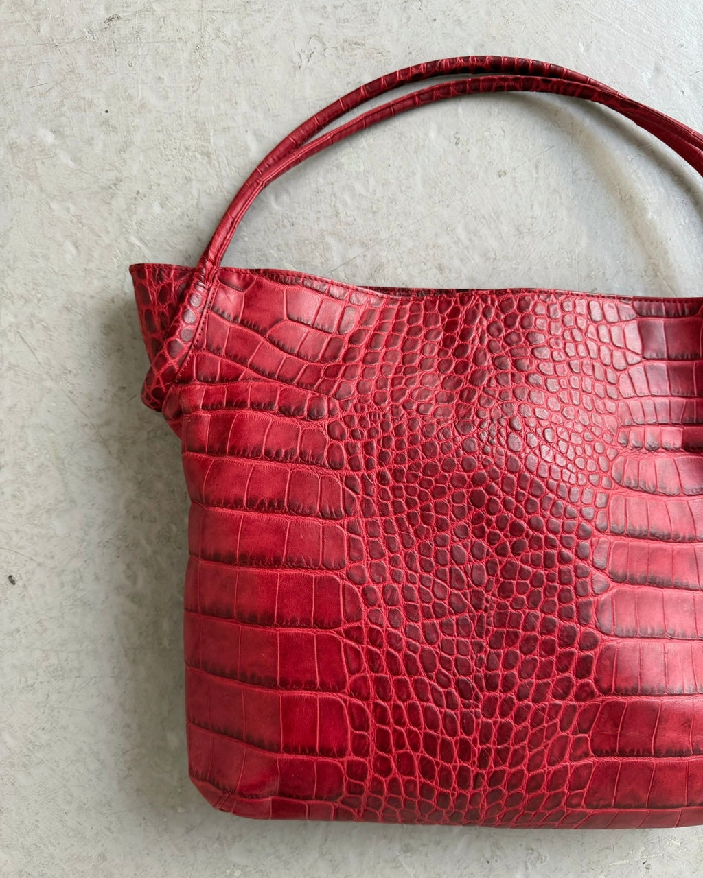 Red croc print bag