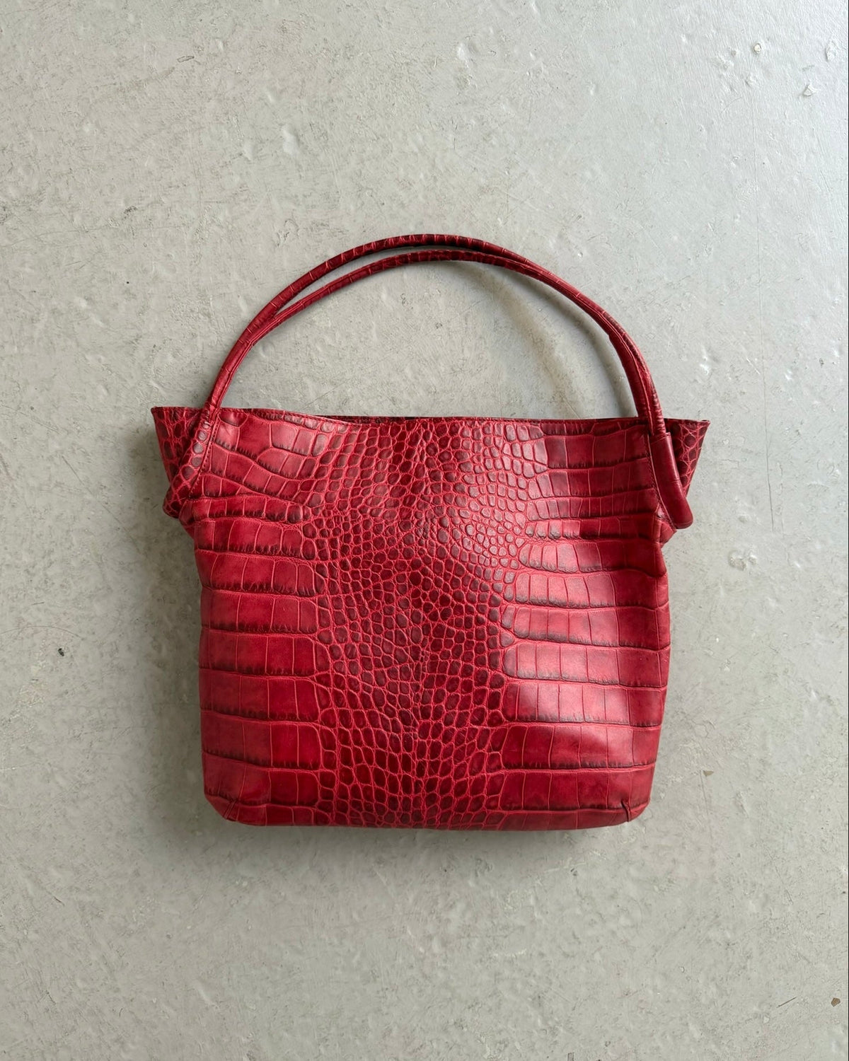 Red croc print bag