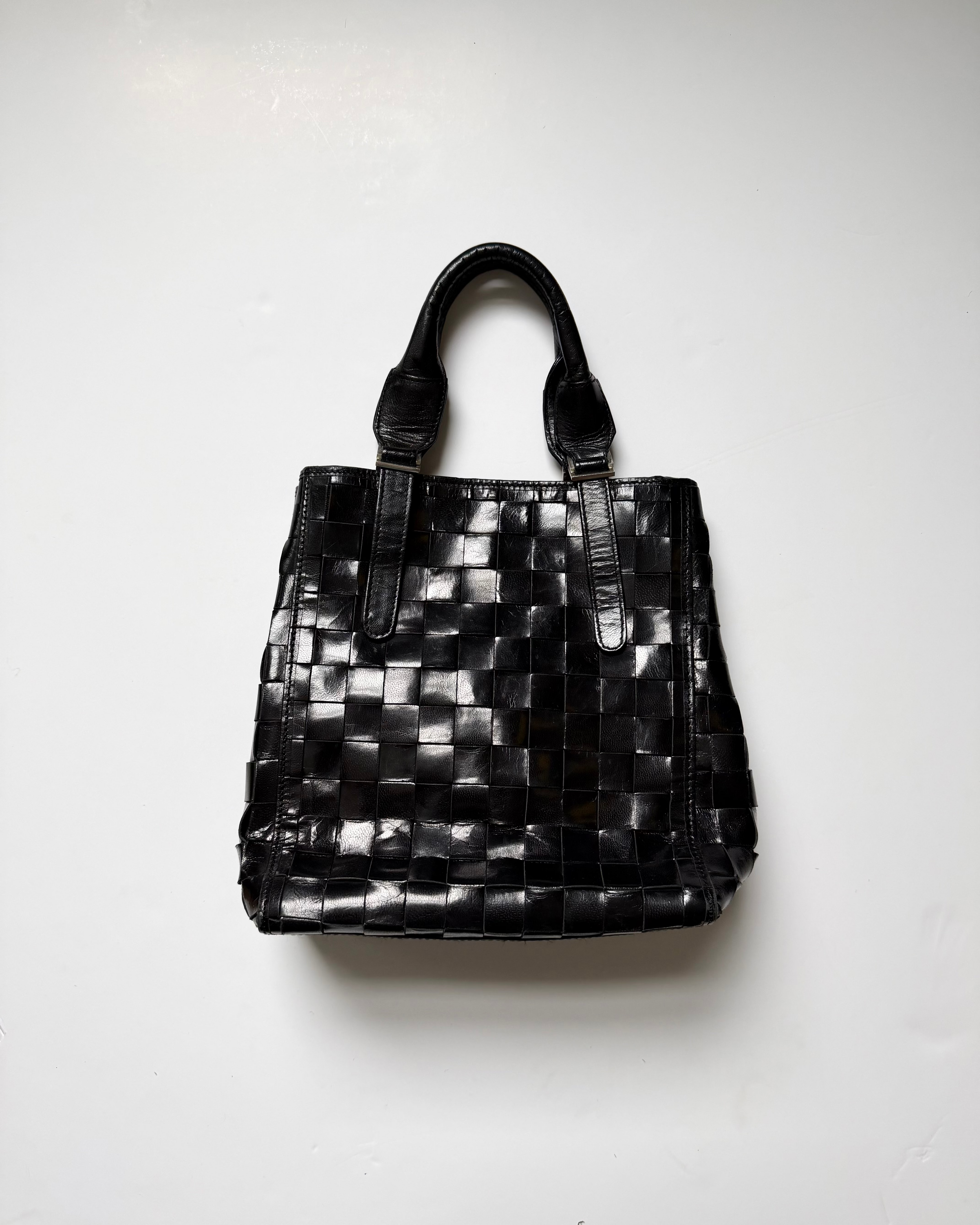 Black woven leather bag