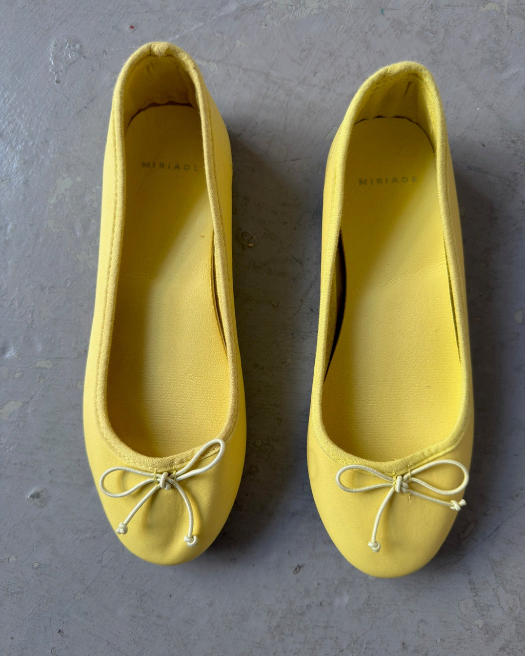 Yellow ballet flats