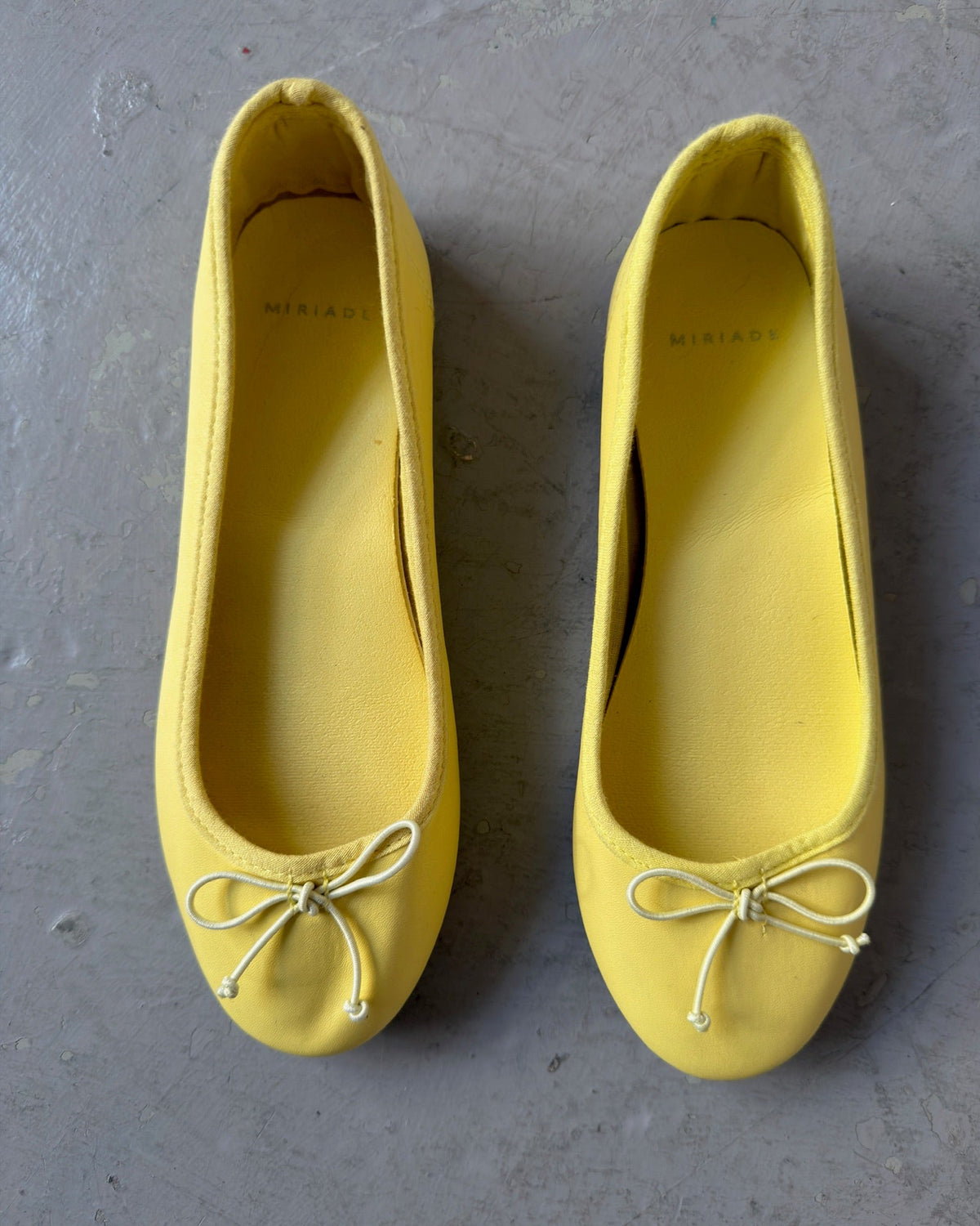 Yellow ballet flats