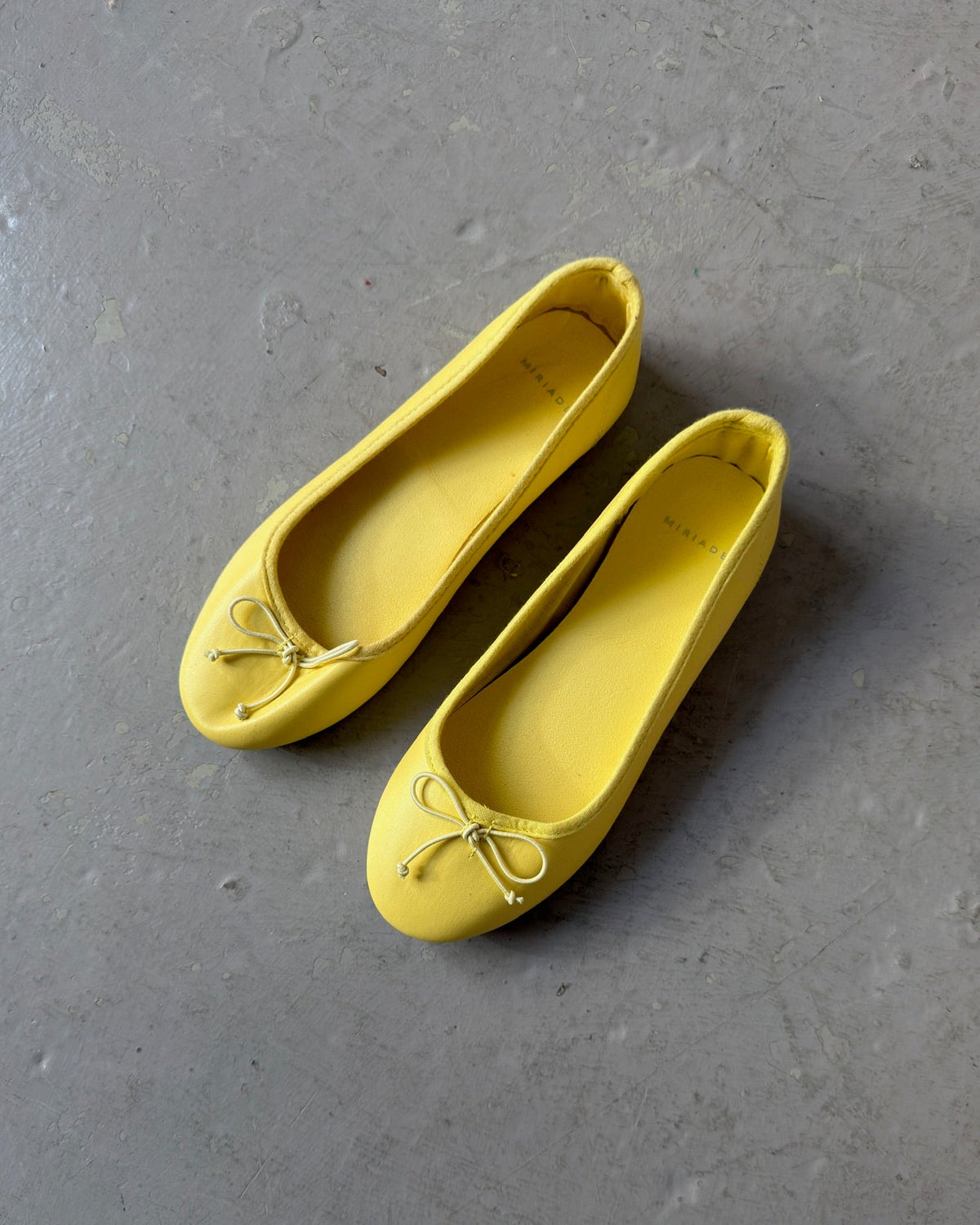 Yellow ballet flats