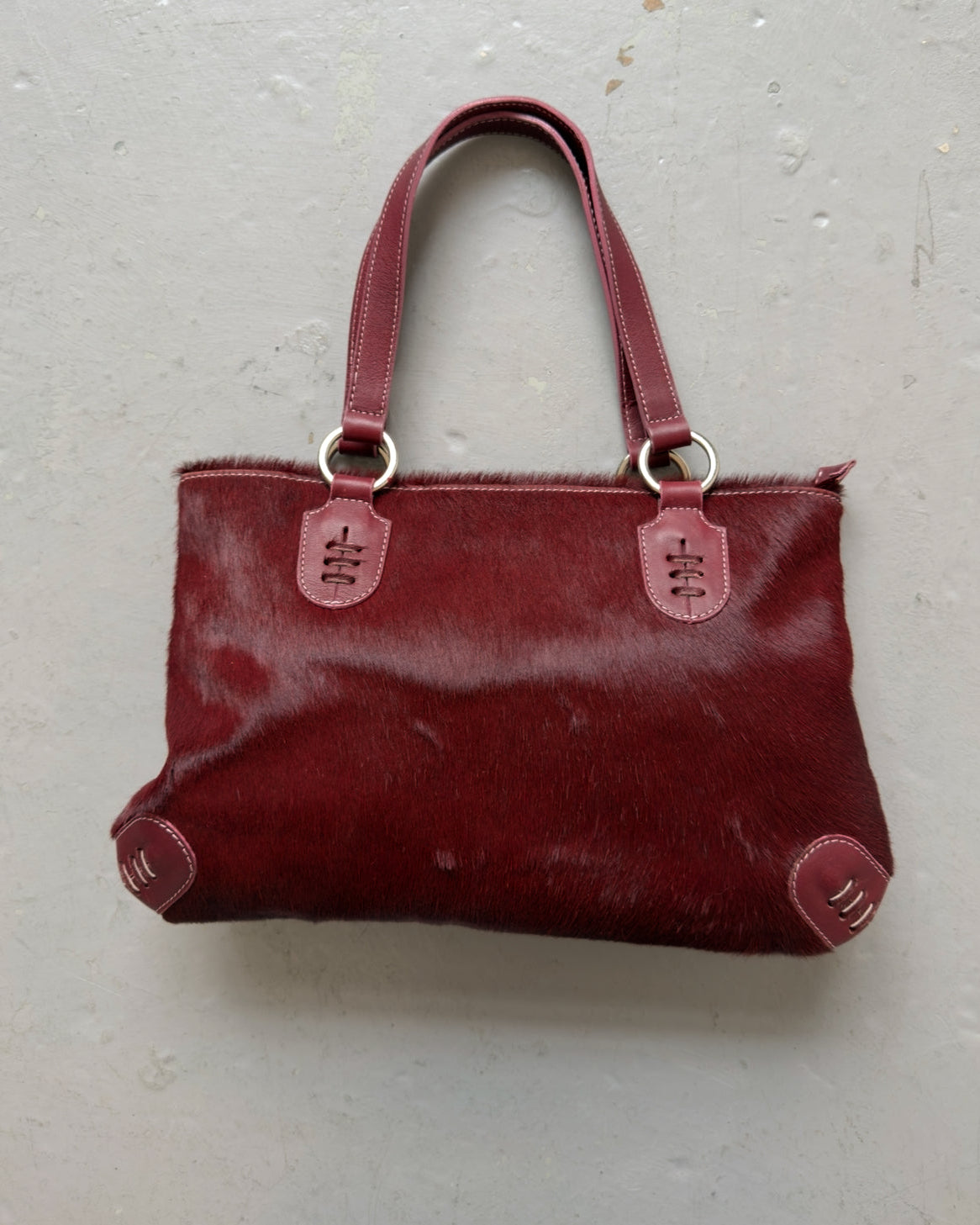 Burgundy cowhide hair bag