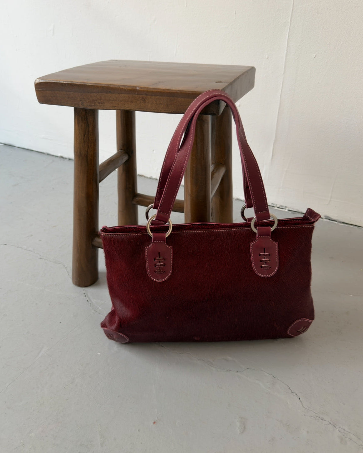 Burgundy cowhide hair bag