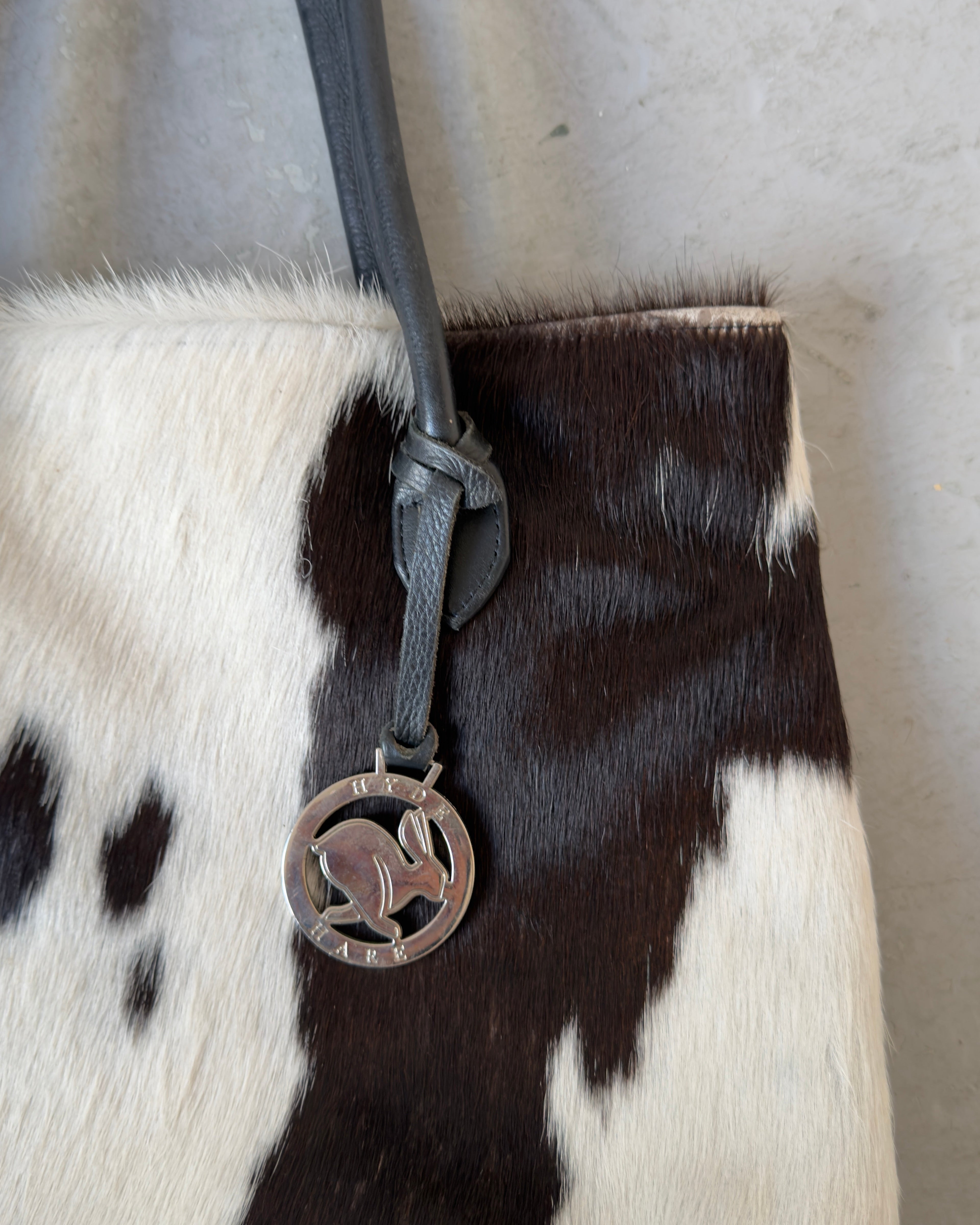 Cowhide shoulder bag