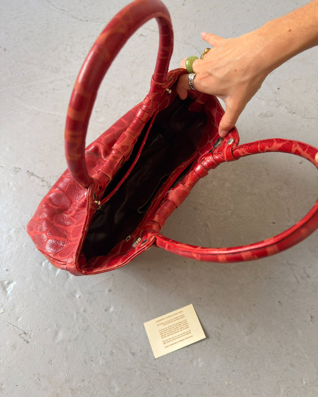 Red crocodile stud bag