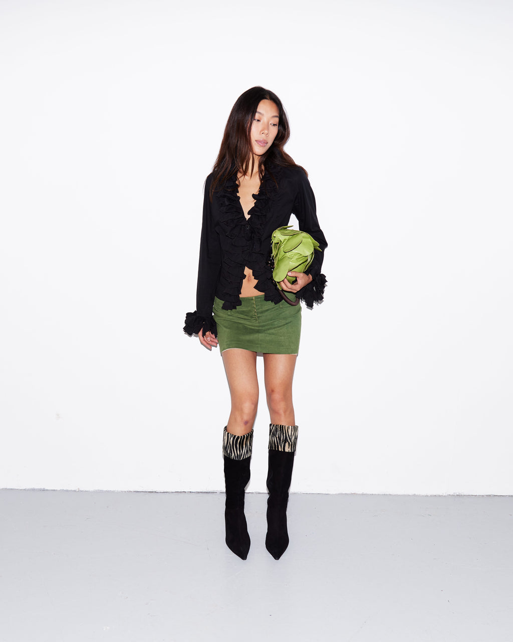 Mini green suede skirt