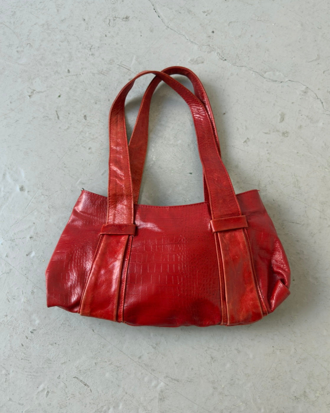 Red crocodile print bag