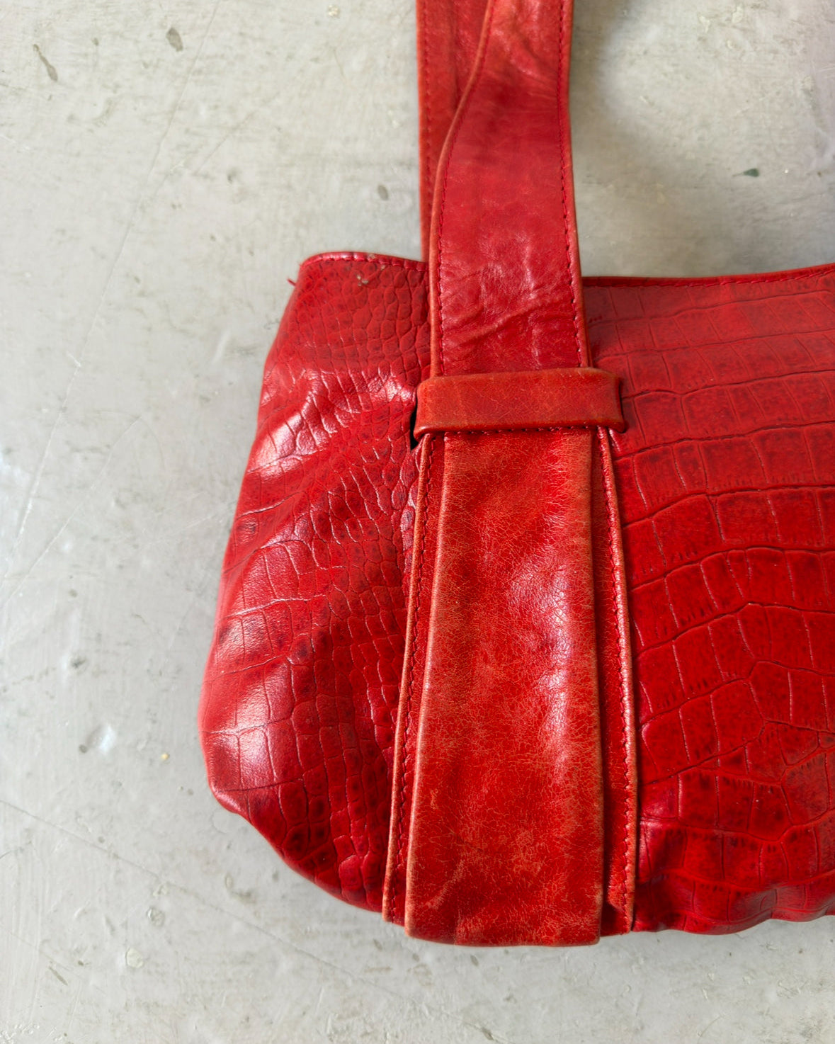 Red crocodile print bag