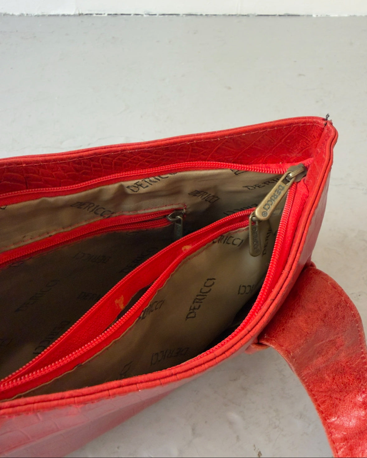 Red crocodile print bag
