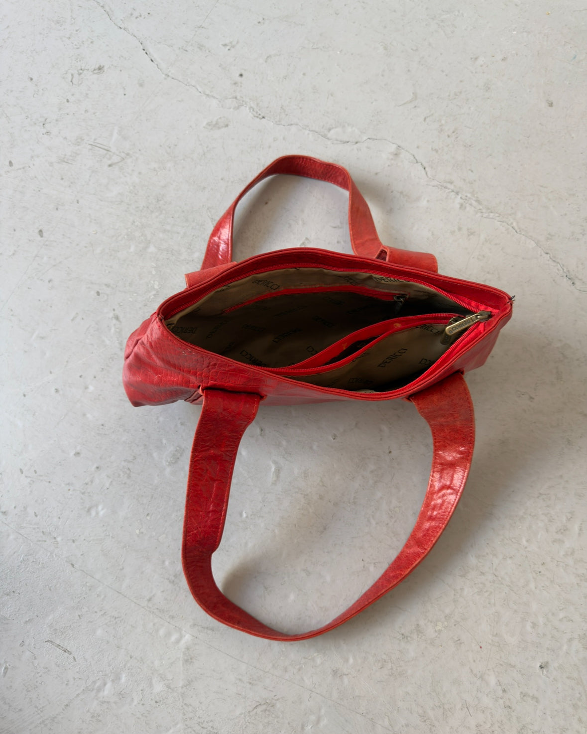 Red crocodile print bag