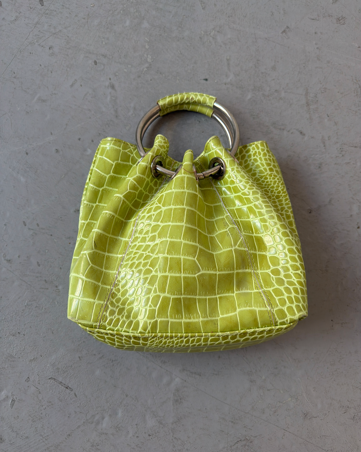 Green croc circle handle bag