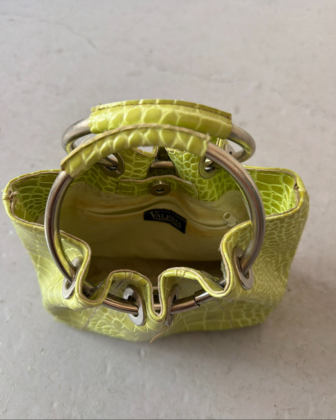 Green croc circle handle bag