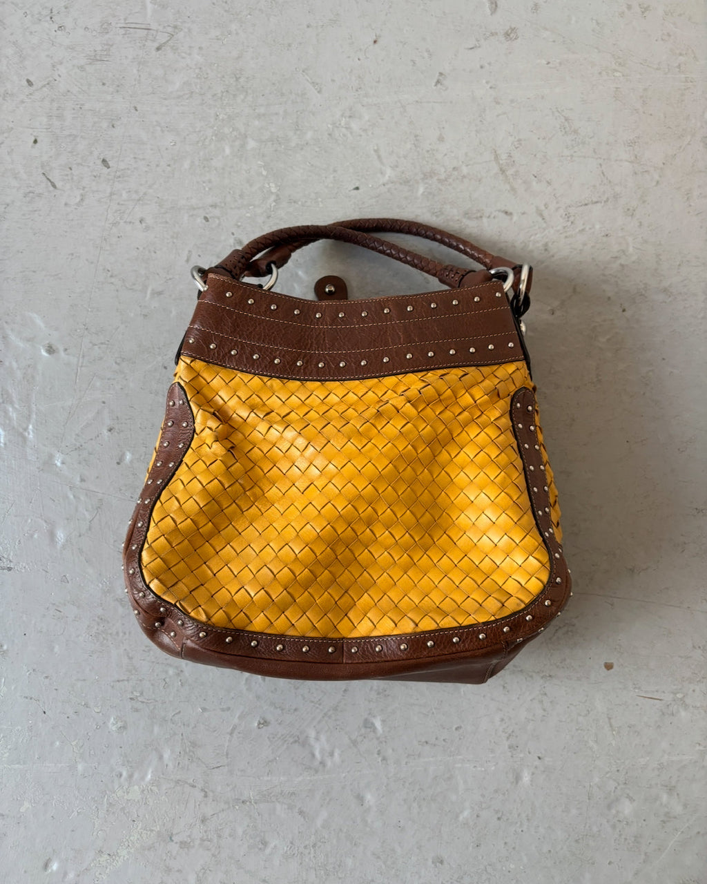Yellow woven stud bag