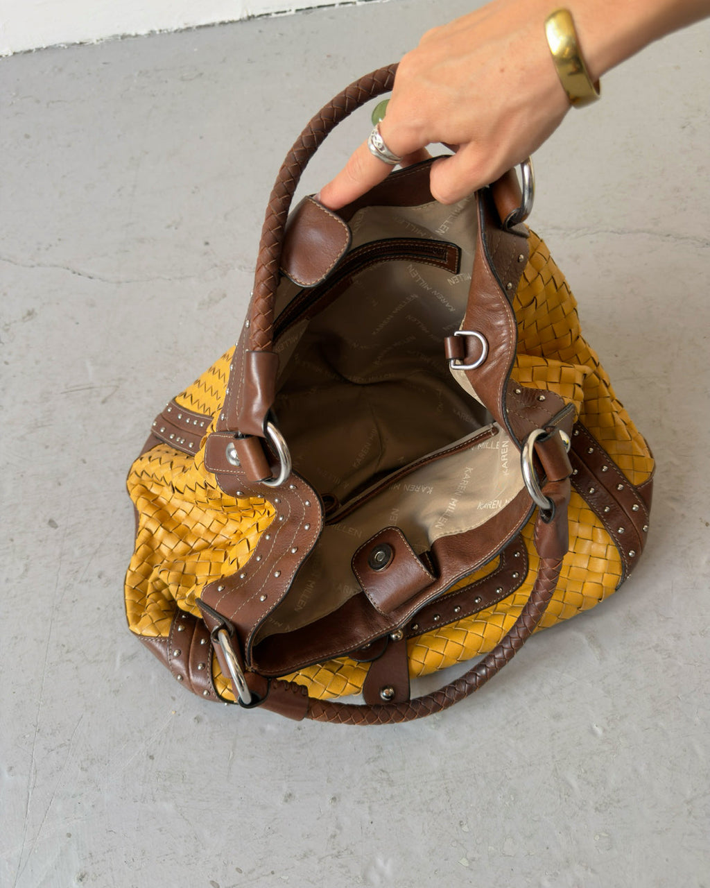 Yellow woven stud bag