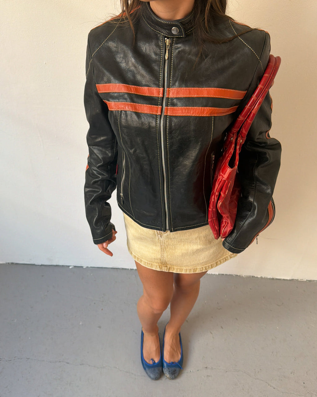 Black and orange leather jacket