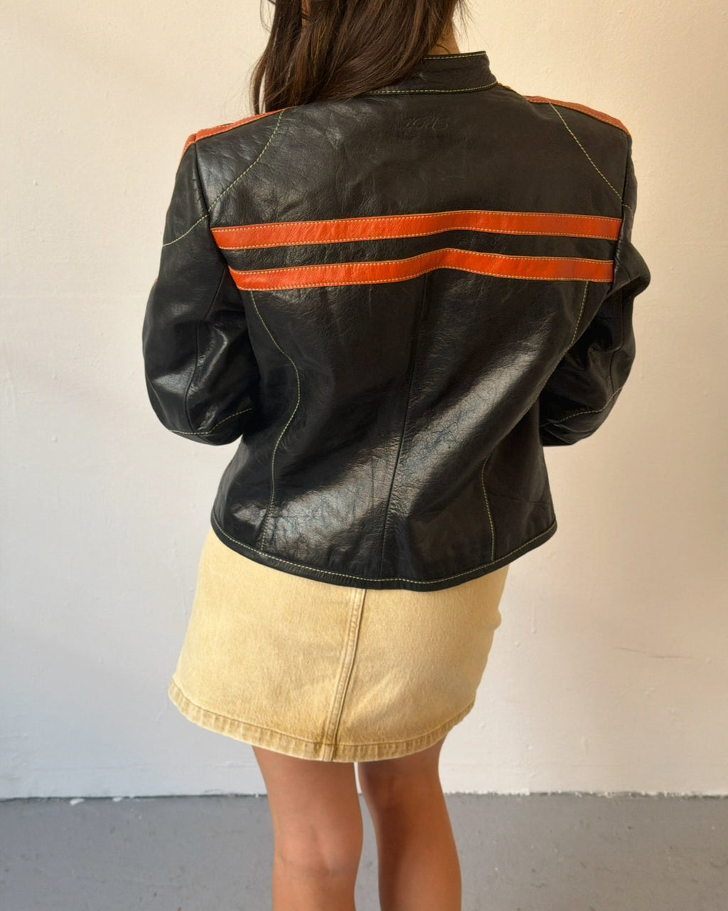 Black and orange leather jacket
