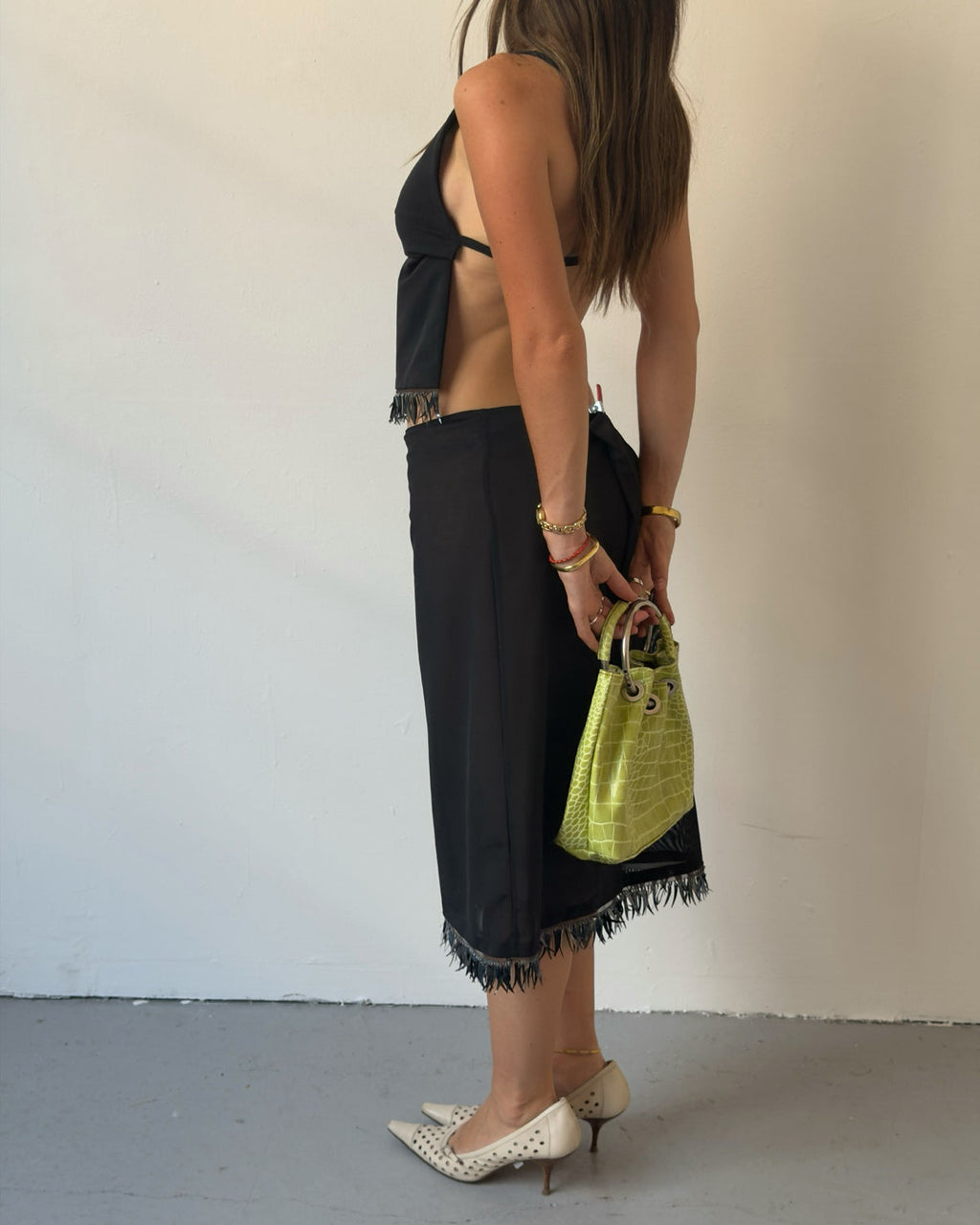 Black backless metallic tassel top