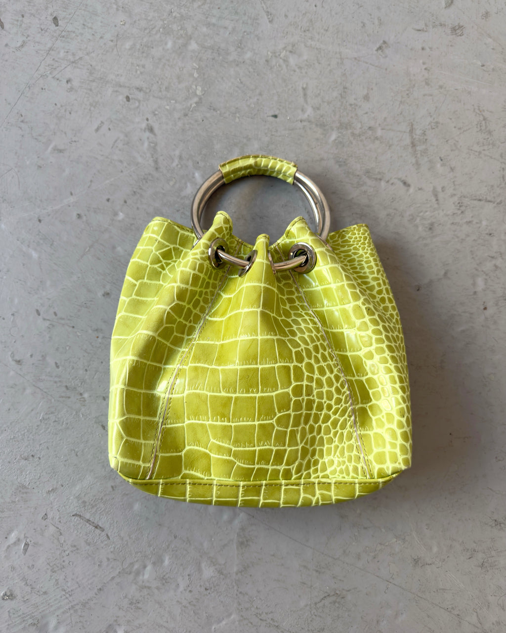 Green croc circle handle bag