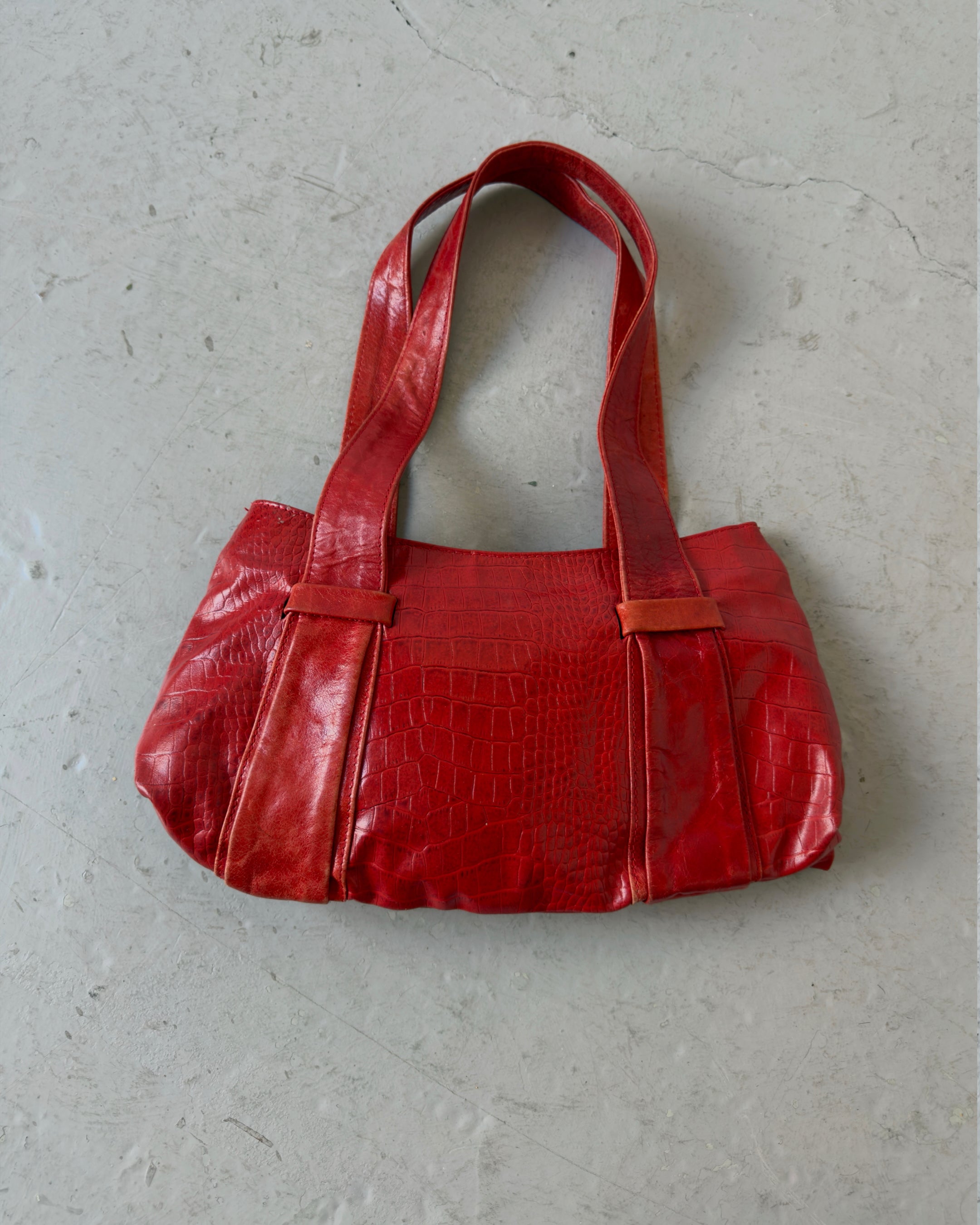 Red crocodile print bag