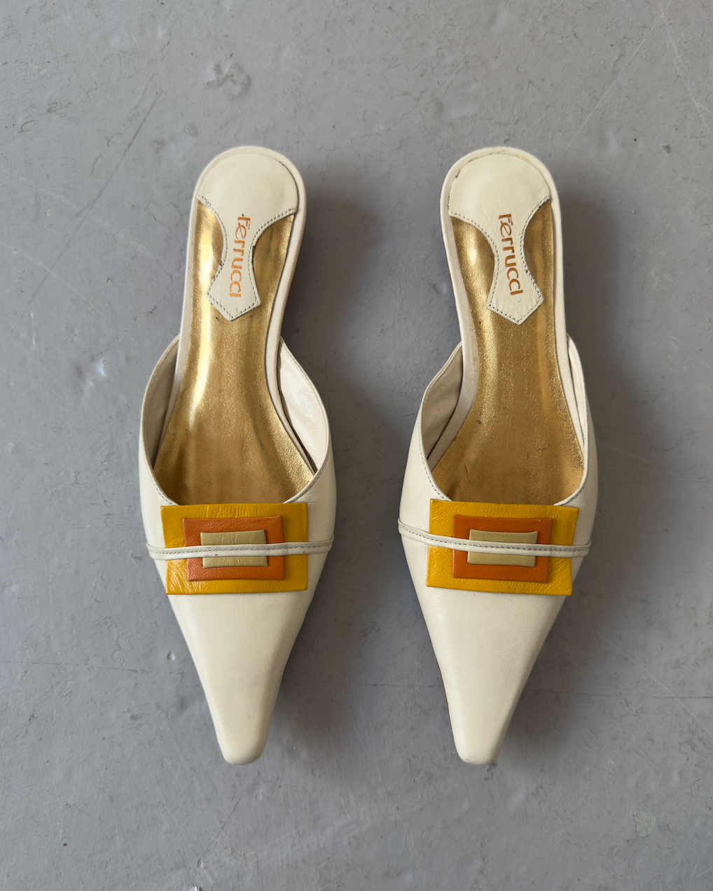 White & orange toned pointed heels