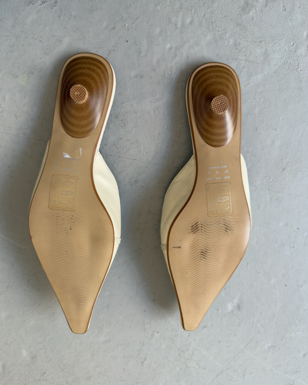 White & orange toned pointed heels