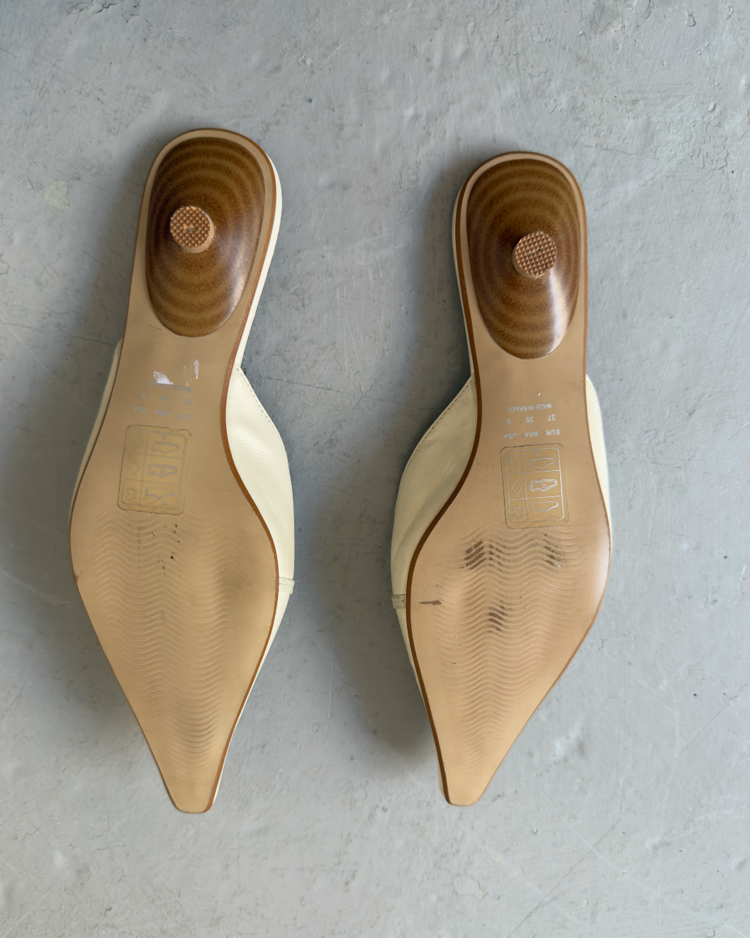 White & orange toned pointed heels
