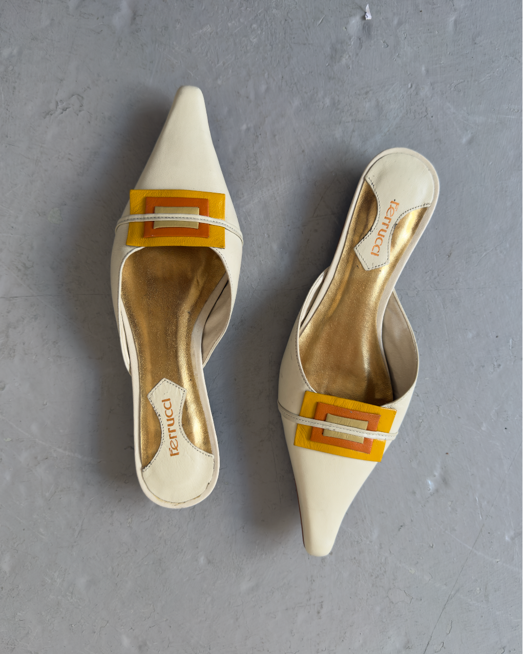 White & orange toned pointed heels