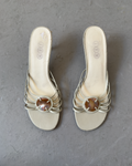 White strappy pearl shell heels