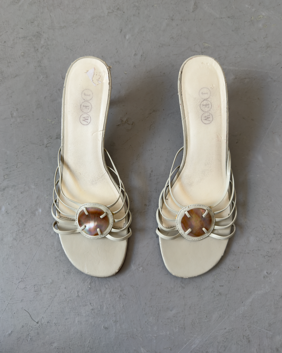 White strappy pearl shell heels