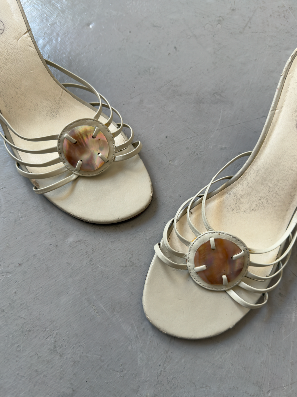 White strappy pearl shell heels