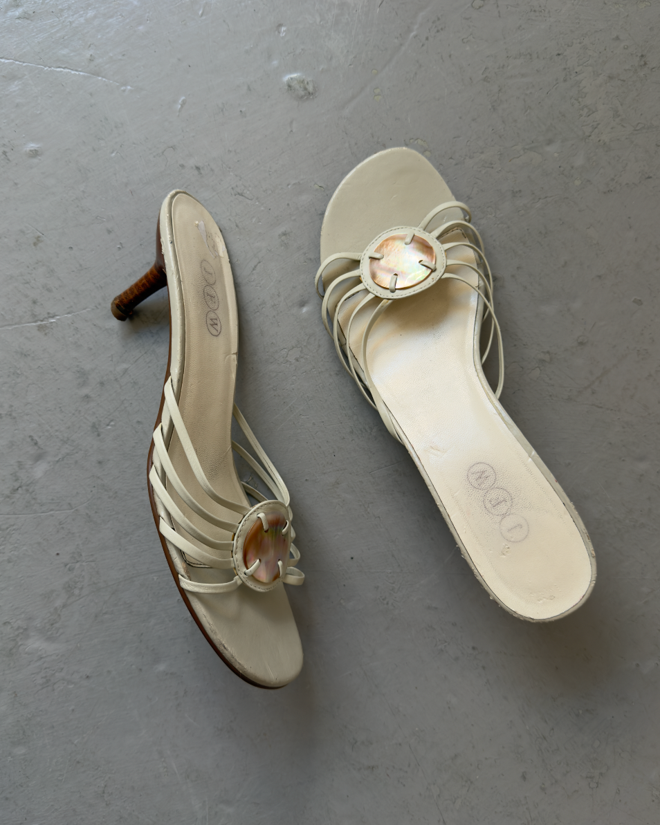 White strappy pearl shell heels
