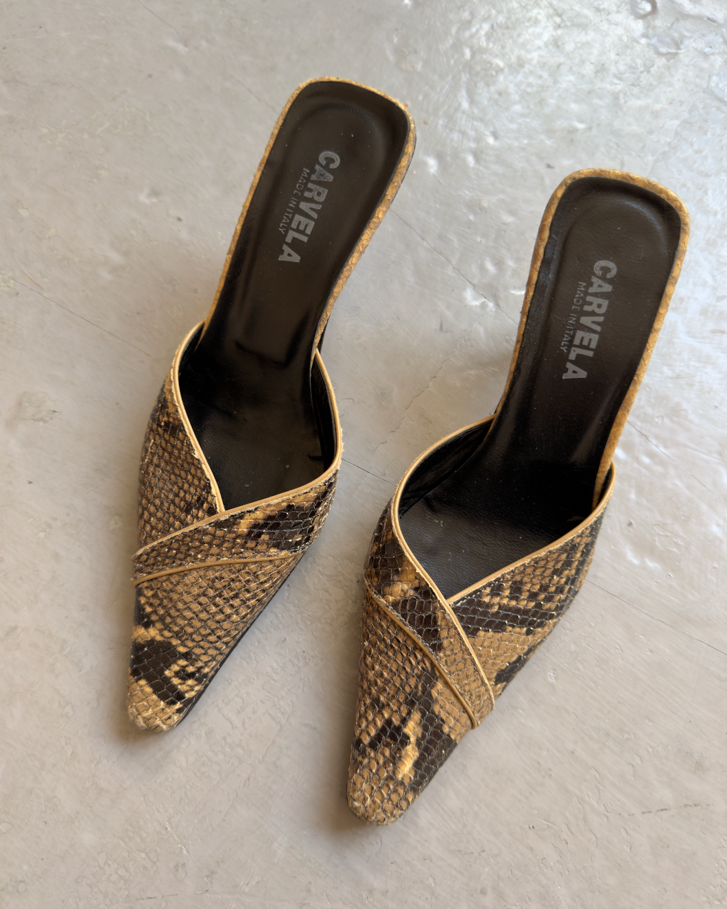 Snakeskin pointed mules