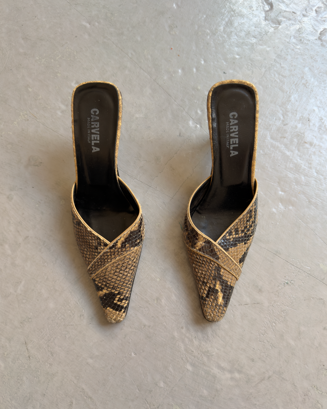 Snakeskin pointed mules